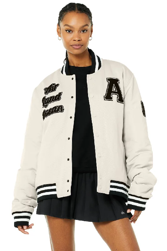 Women's cropped leather coats with silver studs for an edgy look G.O.A.T Jacket - Bone Women's cropped leather coats with silver studs for an edgy look G.O.A.T Jacket - Bone