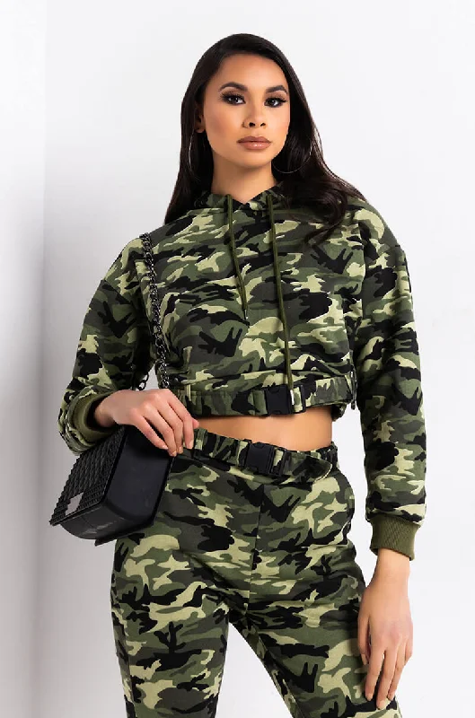 Women's hoodie with a glittery print for a glamorous and sparkly appearance EASY TO SAY SWEATSHIRT GREEN CAMO Women's hoodie with a glittery print for a glamorous and sparkly appearance EASY TO SAY SWEATSHIRT GREEN CAMO
