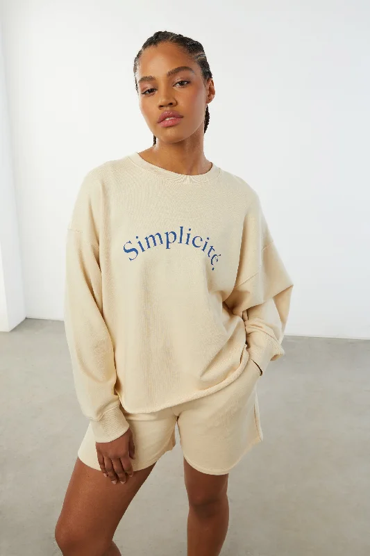 Women's cropped sweatshirt with a lace - trimmed hem for a romantic look GRAPHIC SWEATSHIRT Women's cropped sweatshirt with a lace - trimmed hem for a romantic look GRAPHIC SWEATSHIRT