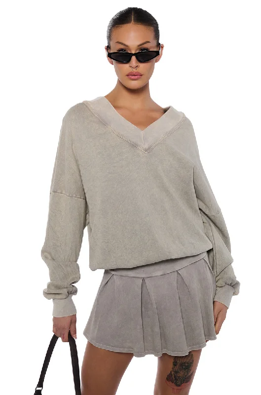 Women's zip - front sweatshirt with contrast stitching for a sporty aesthetic KAYLANI V NECK SWEATSHIRT IN LIGHT GREY Women's zip - front sweatshirt with contrast stitching for a sporty aesthetic KAYLANI V NECK SWEATSHIRT IN LIGHT GREY