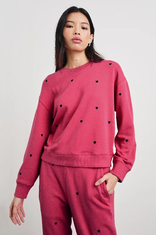 Women's graphic - printed sweatshirt featuring floral patterns for a feminine touch RAMONA SWEATSHIRT - PINK MIDNIGHT HEARTS Women's graphic - printed sweatshirt featuring floral patterns for a feminine touch RAMONA SWEATSHIRT - PINK MIDNIGHT HEARTS
