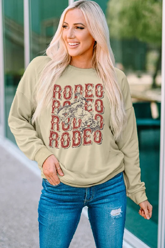 Women's sweatshirt with a mesh panel insert for breathability during workouts Round Neck Dropped Shoulder RODEO Graphic Sweatshirt Women's sweatshirt with a mesh panel insert for breathability during workouts Round Neck Dropped Shoulder RODEO Graphic Sweatshirt
